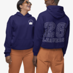 gildan-pullover-hoodie-mockup-featuring-a-cheerful-woman-and-man-standing-in-a-studio-m36560